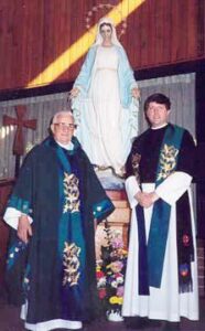 Fr. Bernard Reiser of Coon Rapids, MN, with Fr. Dan.  In 1995, Fr. Reiser donated to us a 1973 Rodgers electronic organ.  Only because of this organ has the parish in Vladivostok been able to make such progress in liturgical music development.