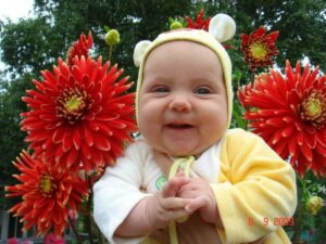 Six-month-old Eseniya enjoying the flowers, thanks to the WSC in Vladivostok.